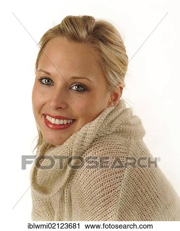 Young woman wearing a knitted sweater, portrait View Large Photo Image Stock Image - Young woman wearing a knitted sweater, portrait. Fotosearch