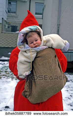 A baby as a present, Santa Claus, Christmas, Sack, Lauda Germany View Large Photo Image Stock Photo - A baby as a present, Santa Claus, Christmas, Sack, Lauda Germany. Fotosearch