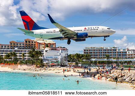 A Boeing 737-700 of Delta Air Lines with the registration number N304DQ at St. Maarten Airport (SXM), Sint Maarten, North America View Large Photo Image Stock Image - A Boeing 737-700 of Delta Air Lines with the registration number N304DQ at St. Maarten Airport (SXM), Sint Maarten, North America. Fotosearch