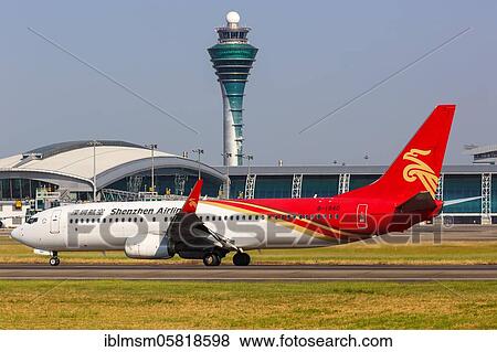 A Boeing 737-800 aircraft of Shenzhen Airlines with registration number B-1940 at Guangzhou Airport (CAN), Guangzhou, China, Asia View Large Photo Image Stock Photo - A Boeing 737-800 aircraft of Shenzhen Airlines with registration number B-1940 at Guangzhou Airport (CAN), Guangzhou, China, Asia. Fotosearch
