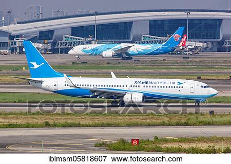 A Boeing 737-800 aircraft of Xiamenair with registration number B-5160 at Guangzhou Airport (CAN), Guangzhou, China, Asia View Large Photo Image Stock Photo - A Boeing 737-800 aircraft of Xiamenair with registration number B-5160 at Guangzhou Airport (CAN), Guangzhou, China, Asia. Fotosearch