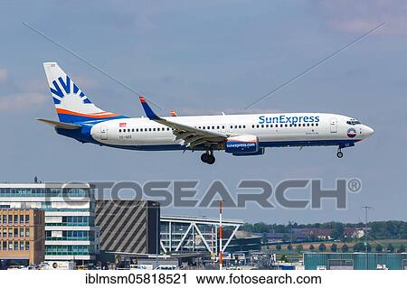 Stock Image - A Boeing 737-800 of SunExpress with the registration TC-SEE at Stuttgart Airport (STR), Stuttgart, Germany, Europe. Fotosearch
