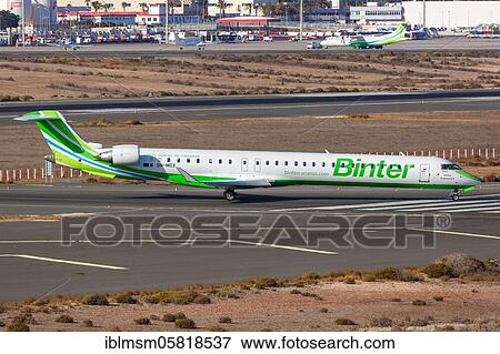 A Bombardier CRJ-1000 aircraft of Binter with the registration number 9H-MOX at Gran Canaria Airport (LPA), Gran Canaria, Spain, Europe View Large Photo Image Stock Photo - A Bombardier CRJ-1000 aircraft of Binter with the registration number 9H-MOX at Gran Canaria Airport (LPA), Gran Canaria, Spain, Europe. Fotosearch