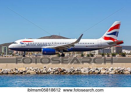 Stock Image - A British Airways Airbus A320 with registration mark G-EUYX at Gibraltar Airport (GIB), Gibraltar, Europe. Fotosearch