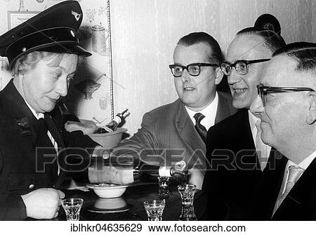 A liquor for three men with 50's eyeglasses, 1950s, exact place unknown, Germany, Europe View Large Photo Image Stock Photo - A liquor for three men with 50's eyeglasses, 1950s, exact place unknown, Germany, Europe. Fotosearch