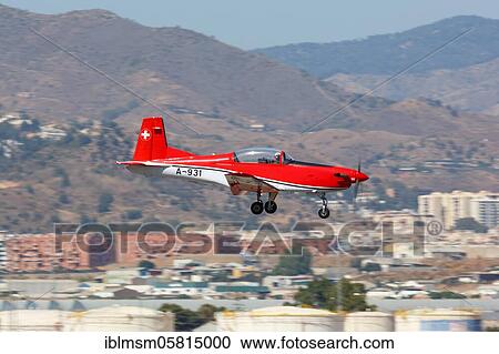 A Pilatus PC-7 of the Swiss Army with the registration number A-931 lands at Malaga Airport (AGP), Malaga, Spain, Europe View Large Photo Image Stock Image - A Pilatus PC-7 of the Swiss Army with the registration number A-931 lands at Malaga Airport (AGP), Malaga, Spain, Europe. Fotosearch