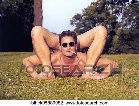 Stock Image - Acrobat, jointed, rubber man, Berlin, Germany, Europe. Fotosearch