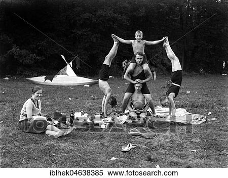 Stock Photography - Acrobatics at a picnic, ca. 1929, 1920s, exact place unknown, Germany, Europe. Fotosearch
