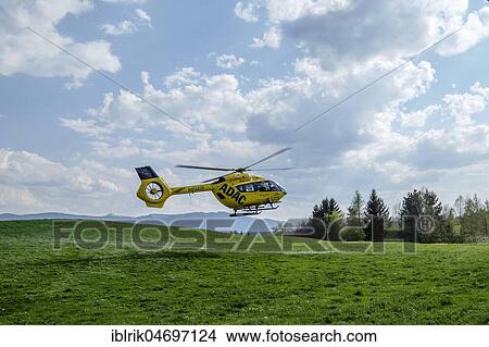 ADAC emergency helicopter at take-off, Voralpenland, Upper Bavaria, Bavaria, Germany, Europe View Large Photo Image Picture - ADAC emergency helicopter at take-off, Voralpenland, Upper Bavaria, Bavaria, Germany, Europe. Fotosearch
