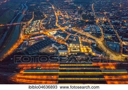 Aerial photo, view of the main train station and Platz der Deutschen Einheit at night, Hamm, Ruhr area, North Rhine-Westphalia View Large Photo Image Stock Image - Aerial photo, view of the main train station and Platz der Deutschen Einheit at night, Hamm, Ruhr area, North Rhine-Westphalia. Fotosearch