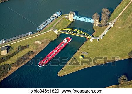 Aerial view, Cargo ship in the connection between the Ruhr and Rhein-Herne Canal near Duisburg, North Rhine-Westphalia, Germany, Europe View Large Photo Image Stock Image - Aerial view, Cargo ship in the connection between the Ruhr and Rhein-Herne Canal near Duisburg, North Rhine-Westphalia, Germany, Europe. Fotosearch
