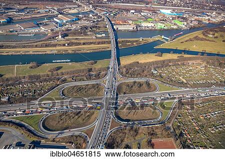 Aerial view, Motorway junction Duisburg motorway A59 and motorway A40 at the Rhein-Herne Canal, Duisburg, North Rhine-Westphalia, Germany, Europe View Large Photo Image Stock Photography - Aerial view, Motorway junction Duisburg motorway A59 and motorway A40 at the Rhein-Herne Canal, Duisburg, North Rhine-Westphalia, Germany, Europe. Fotosearch