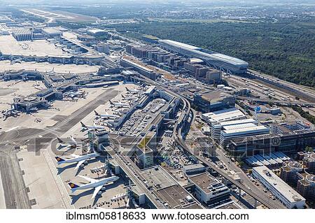 Aerial view of Terminal 1 and Lufthansa aircraft at Frankfurt Airport FRA during the Coronavirus Corona Virus COVID-19, Frankfurt, Germany, Europe View Large Photo Image Stock Image - Aerial view of Terminal 1 and Lufthansa aircraft at Frankfurt Airport FRA during the Coronavirus Corona Virus COVID-19, Frankfurt, Germany, Europe. Fotosearch