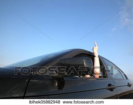 Stock Photo - Aggressive driver, Fuck you, Berlin, Germany, Europe. Fotosearch