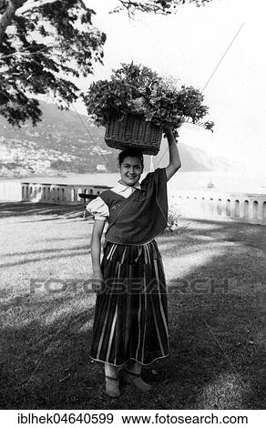 Agriculture, woman selling flowers, 1940s, exact place unknown, Italy, Europe View Large Photo Image Stock Photo - Agriculture, woman selling flowers, 1940s, exact place unknown, Italy, Europe. Fotosearch