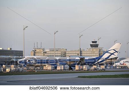 Air Bridge Cargo, Boeing, B747-800, Freighter, Cargo, Freight loading, dusk, Munich Airport, Upper Bavaria, Bavaria, Germany, Europe View Large Photo Image Stock Photograph - Air Bridge Cargo, Boeing, B747-800, Freighter, Cargo, Freight loading, dusk, Munich Airport, Upper Bavaria, Bavaria, Germany, Europe. Fotosearch
