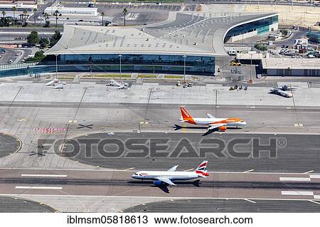 Airbus A320 of British Airways and EasyJet aircraft at Gibraltar Airport (GIB), Gibraltar, Europe View Large Photo Image Stock Image - Airbus A320 of British Airways and EasyJet aircraft at Gibraltar Airport (GIB), Gibraltar, Europe. Fotosearch