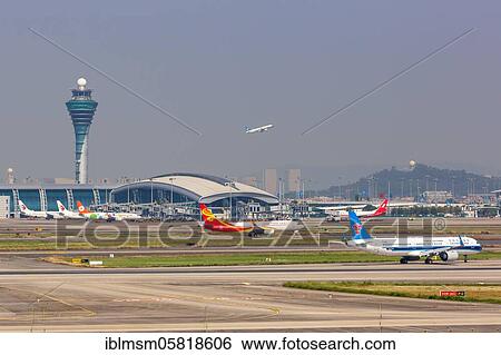 Aircraft at Guangzhou Baiyun (CAN) Airport, Guangzhou, China, Asia View Large Photo Image Stock Photograph - Aircraft at Guangzhou Baiyun (CAN) Airport, Guangzhou, China, Asia. Fotosearch