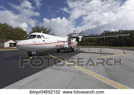 Stock Image - Airplane, ATR 72, Avions de Transport Régional, Air Tahiti, Airport, Rangiroa Island, Society Islands, Windward Islands, French Polynesia, Oceania. Fotosearch
