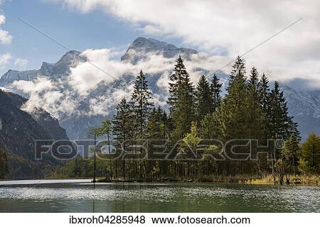 Stock Photo - Almsee im Herbst mit Wolken, Totes Gebirge, Almtal, Oberosterreich, Osterreich, Europa. Fotosearch