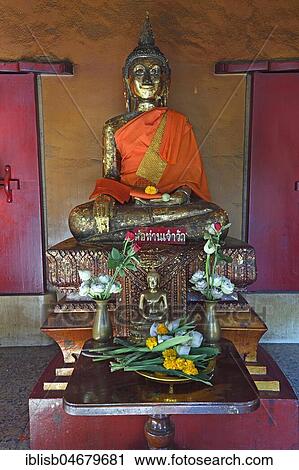 Stock Image - Altar with Bubbhastatue, Wat Chalong, largest temple on Phuket, Thailand, Asia. Fotosearch