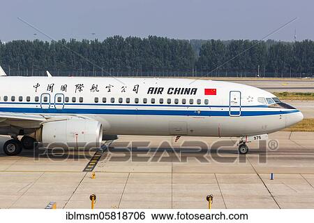 An Air China Boeing 737-800 aircraft with registration number B-1975 at Beijing Airport (PEK), Beijing, China, Asia View Large Photo Image Stock Photograph - An Air China Boeing 737-800 aircraft with registration number B-1975 at Beijing Airport (PEK), Beijing, China, Asia. Fotosearch