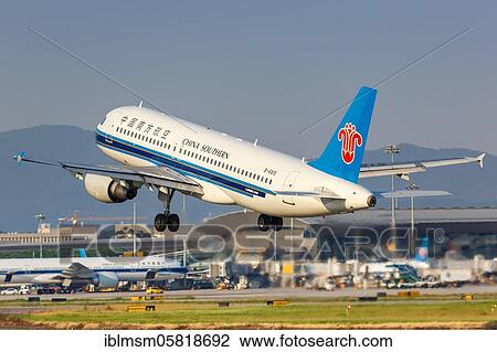 Stock Image - An Airbus A320 aircraft of China Southern Airlines with registration number B-6815 at Guangzhou Baiyun (CAN) Airport, Guangzhou, China, Asia. Fotosearch