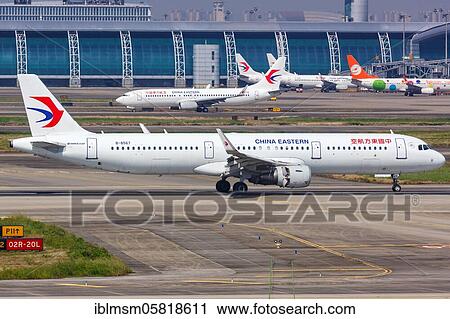 An Airbus A321 aircraft of China Eastern Airlines with registration number B-8567 at Guangzhou Baiyun (CAN) Airport, Guangzhou, China, Asia View Large Photo Image Stock Image - An Airbus A321 aircraft of China Eastern Airlines with registration number B-8567 at Guangzhou Baiyun (CAN) Airport, Guangzhou, China, Asia. Fotosearch
