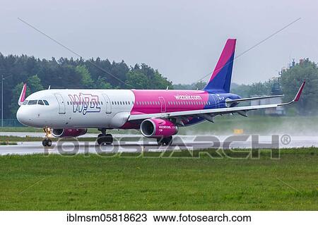An Airbus A321 aircraft of Wizzair with registration HA-LXF at Gdansk Airport (GDN), Gdansk, Poland, Europe View Large Photo Image Stock Image - An Airbus A321 aircraft of Wizzair with registration HA-LXF at Gdansk Airport (GDN), Gdansk, Poland, Europe. Fotosearch