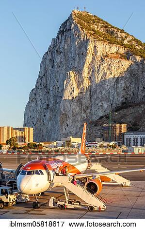 An Easyjet Airbus A320 with the registration number G-EZOM at Gibraltar Airport (GIB), Gibraltar, Europe View Large Photo Image Stock Photo - An Easyjet Airbus A320 with the registration number G-EZOM at Gibraltar Airport (GIB), Gibraltar, Europe. Fotosearch