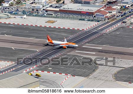 An Easyjet Airbus A320 with the registration number G-EZRM at Gibraltar Airport (GIB), Gibraltar, Europe View Large Photo Image Stock Photograph - An Easyjet Airbus A320 with the registration number G-EZRM at Gibraltar Airport (GIB), Gibraltar, Europe. Fotosearch