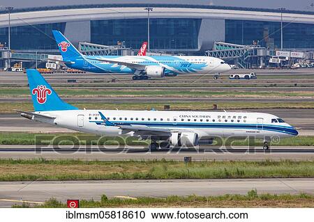 An Embraer 190 aircraft of China Southern Airlines with registration number B-3135 at Guangzhou (CAN) Airport, Guangzhou, China, Asia View Large Photo Image Stock Image - An Embraer 190 aircraft of China Southern Airlines with registration number B-3135 at Guangzhou (CAN) Airport, Guangzhou, China, Asia. Fotosearch