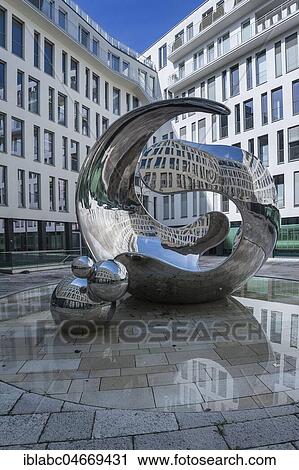 Stock Image - Angerhofbrunnen, Modern stainless steel sculpture Air born by Christopher Klein, Linde headquarters, Munich, Upper Bavaria, Bavaria, Germany, Europe. Fotosearch