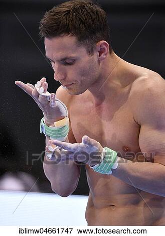 Apparatus gymnastics, Andreas Bretschneider, GER, spits into hands, Porsche Arena, Stuttgart, Baden-Württemberg, Germany, Europe View Large Photo Image Stock Photo - Apparatus gymnastics, Andreas Bretschneider, GER, spits into hands, Porsche Arena, Stuttgart, Baden-Württemberg, Germany, Europe. Fotosearch