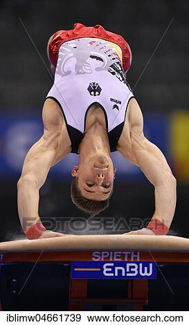 Stock Photo - Apparatus gymnastics, Carlo Hörr, GER, jump, Porsche Arena, Stuttgart, Baden-Württemberg, Germany, Europe. Fotosearch