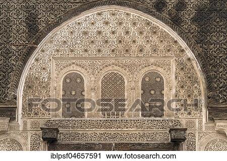Artful carved decorations over a gate, Koranic school Medersa Bou Inania, Fez, Morocco, Africa View Large Photo Image Stock Image - Artful carved decorations over a gate, Koranic school Medersa Bou Inania, Fez, Morocco, Africa. Fotosearch