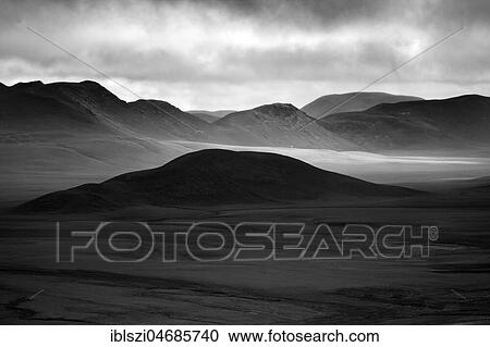 Barren, mountainous landscape with light and shades, monochrome, Mödrudalsfjallgardur, Highlands, Iceland, Europe View Large Photo Image Stock Image - Barren, mountainous landscape with light and shades, monochrome, Mödrudalsfjallgardur, Highlands, Iceland, Europe. Fotosearch