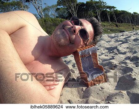 Picture - Beach holiday, small wicker beach chair, Baltic Sea, Germany, Europe. Fotosearch