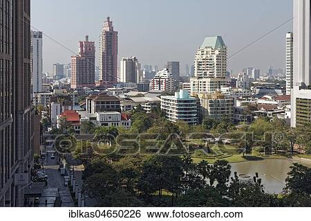 Benchasiri Park and Skyline Sukhumvit, view from EM quarter, Khlong Toei, Bangkok, Thailand, Asia View Large Photo Image Stock Photograph - Benchasiri Park and Skyline Sukhumvit, view from EM quarter, Khlong Toei, Bangkok, Thailand, Asia. Fotosearch