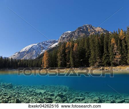 Bergsee, Obernbergersee, hinten Berg Tribulaun mit Schnee, Obernbergtal, Stubaier Alpen, Tirol, Osterreich, Europa View Large Photo Image Stock Photograph - Bergsee, Obernbergersee, hinten Berg Tribulaun mit Schnee, Obernbergtal, Stubaier Alpen, Tirol, Osterreich, Europa. Fotosearch