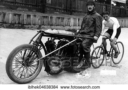 Bicycle rider in tow of a motorcyclist, ca. 1920, 1920s, exact place unknown, Germany, Europe View Large Photo Image Picture - Bicycle rider in tow of a motorcyclist, ca. 1920, 1920s, exact place unknown, Germany, Europe. Fotosearch