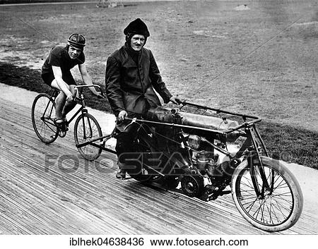 Bicycle rider in tow of a motorcyclist, ca. 1920, 1920s, exact place unknown, Germany, Europe View Large Photo Image Stock Photograph - Bicycle rider in tow of a motorcyclist, ca. 1920, 1920s, exact place unknown, Germany, Europe. Fotosearch
