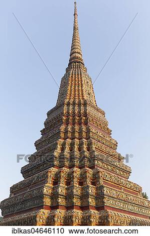 Stock Image - Big Chedi of the Phra-Maha-Chedi-Si-Ratchakan-Group, decorated with coloured tiles, Wat Pho, Buddhist temple complex, Rattanakosin, Bangkok, Thailand, Asia. Fotosearch