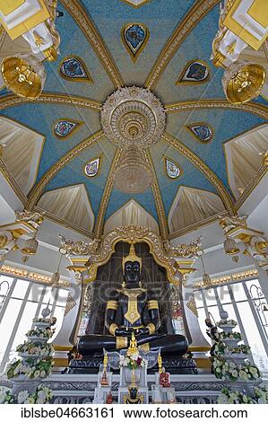 Stock Image - Black Buddha in Maha Rattana Chedi of Wat Thung Setthi, Khon Kaen, Isan, Thailand, Asia. Fotosearch