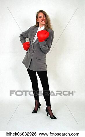 Stock Photograph - Blonde woman with boxing gloves, Berlin, Germany, Europe. Fotosearch