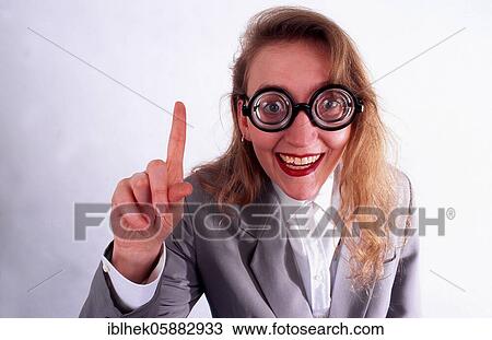 Stock Image - Blonde woman with glasses talks, Berlin, Germany, Europe. Fotosearch