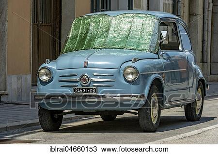 Blue FIAT 600, Seicento, oldtimer, with sun protection on windscreen, Molise, Italy, Europe View Large Photo Image Stock Image - Blue FIAT 600, Seicento, oldtimer, with sun protection on windscreen, Molise, Italy, Europe. Fotosearch