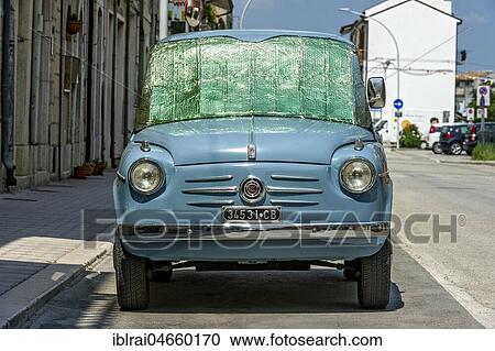 Blue FIAT 600, Seicento, oldtimer, with sun protection on windscreen, Molise, Italy, Europe View Large Photo Image Stock Image - Blue FIAT 600, Seicento, oldtimer, with sun protection on windscreen, Molise, Italy, Europe. Fotosearch