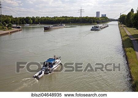 Boat and cargo ships on the Datteln-Hamm Canal, Datteln, Ruhr Area, North Rhine-Westphalia, Germany, Europe View Large Photo Image Stock Photography - Boat and cargo ships on the Datteln-Hamm Canal, Datteln, Ruhr Area, North Rhine-Westphalia, Germany, Europe. Fotosearch
