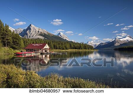 Boathouse with canoes on the shores of Maligne Lake, Jasper National Park, Rocky Mountains, Alberta, Canada, North America View Large Photo Image Stock Photo - Boathouse with canoes on the shores of Maligne Lake, Jasper National Park, Rocky Mountains, Alberta, Canada, North America. Fotosearch